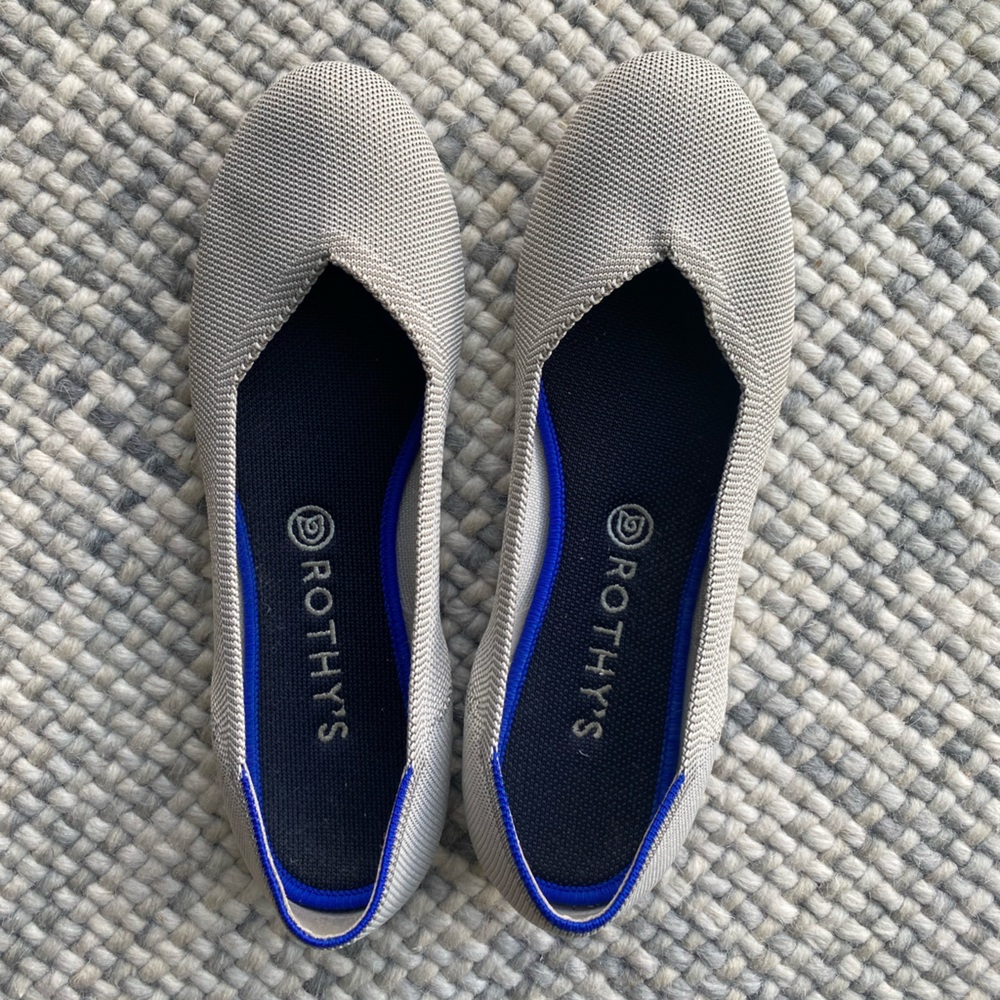 Gray Rothys.  Stain on one of the heels (pictured) from normal wear.